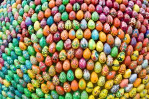 1490833-thousends-painted-handmade-wooden-easter-eggs-eastern-background